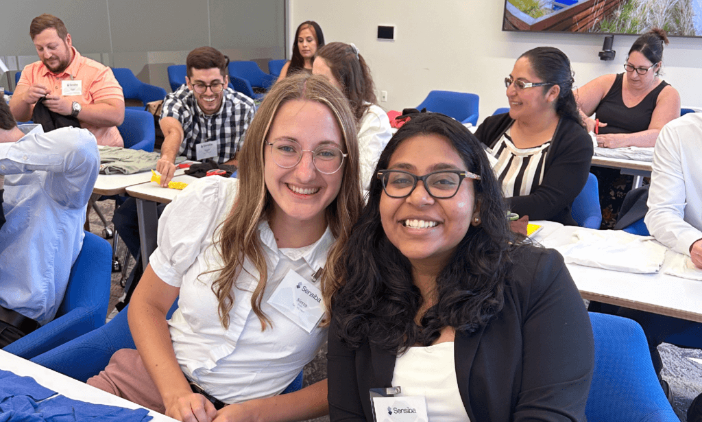 Two people smiling