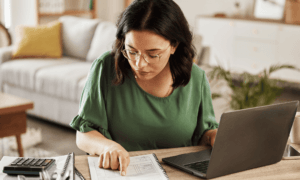 Someone looking at a document on a desk