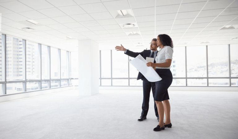 two people looking at real estate.