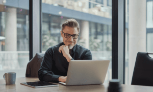 A person looking at laptop.