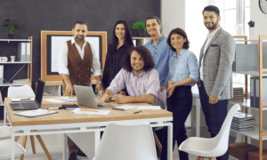 A group of people smiling at the camera.