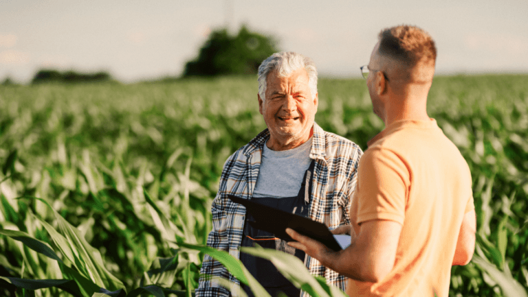 Two people at a farm.