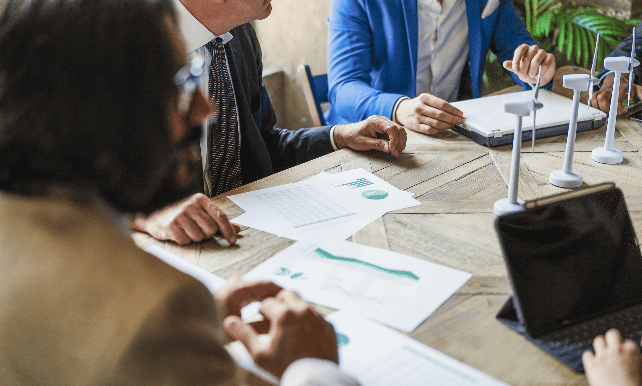 People discussing esg reports.