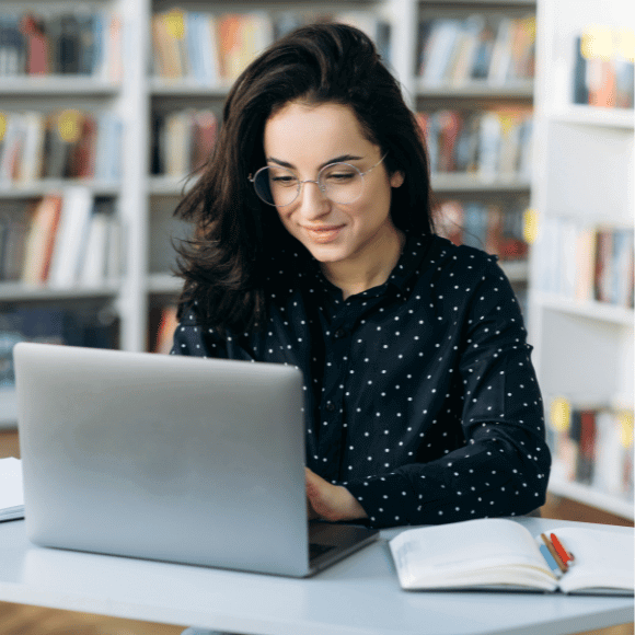 Someone looking at a computer.