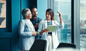 Three people talking