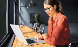 Person working off of a laptop.