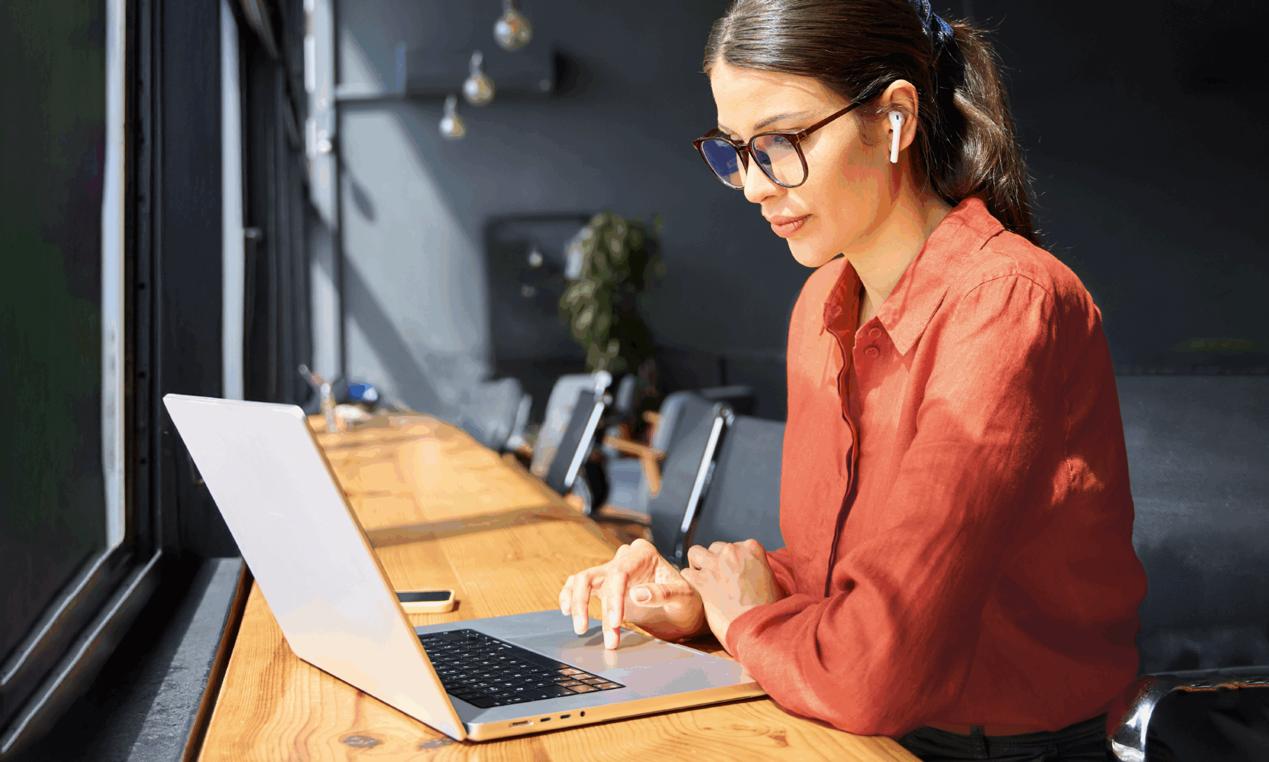 Person working off of a laptop.