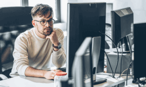 Someone looking at a computer