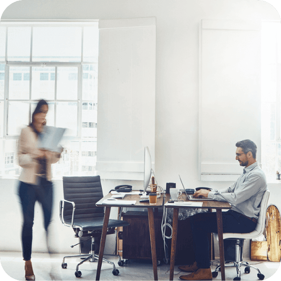 Two people in an office