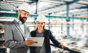 Two people looking at a tablet