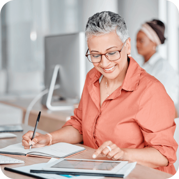 Someone working at a desk.