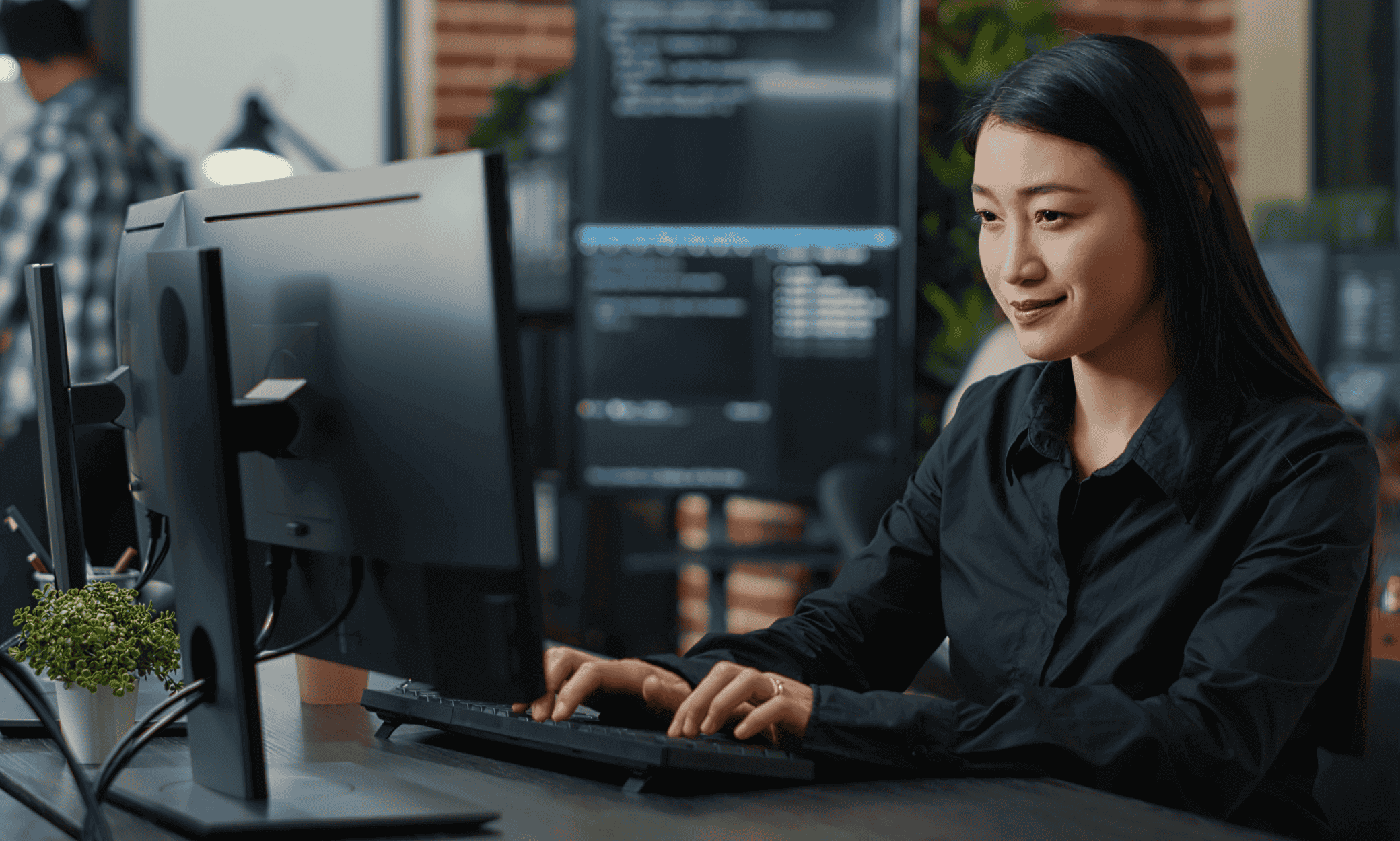 Someone using a laptop.