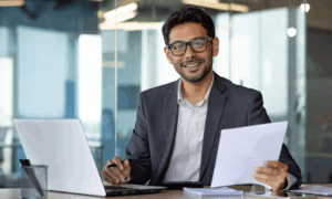 Someone holding a paper.