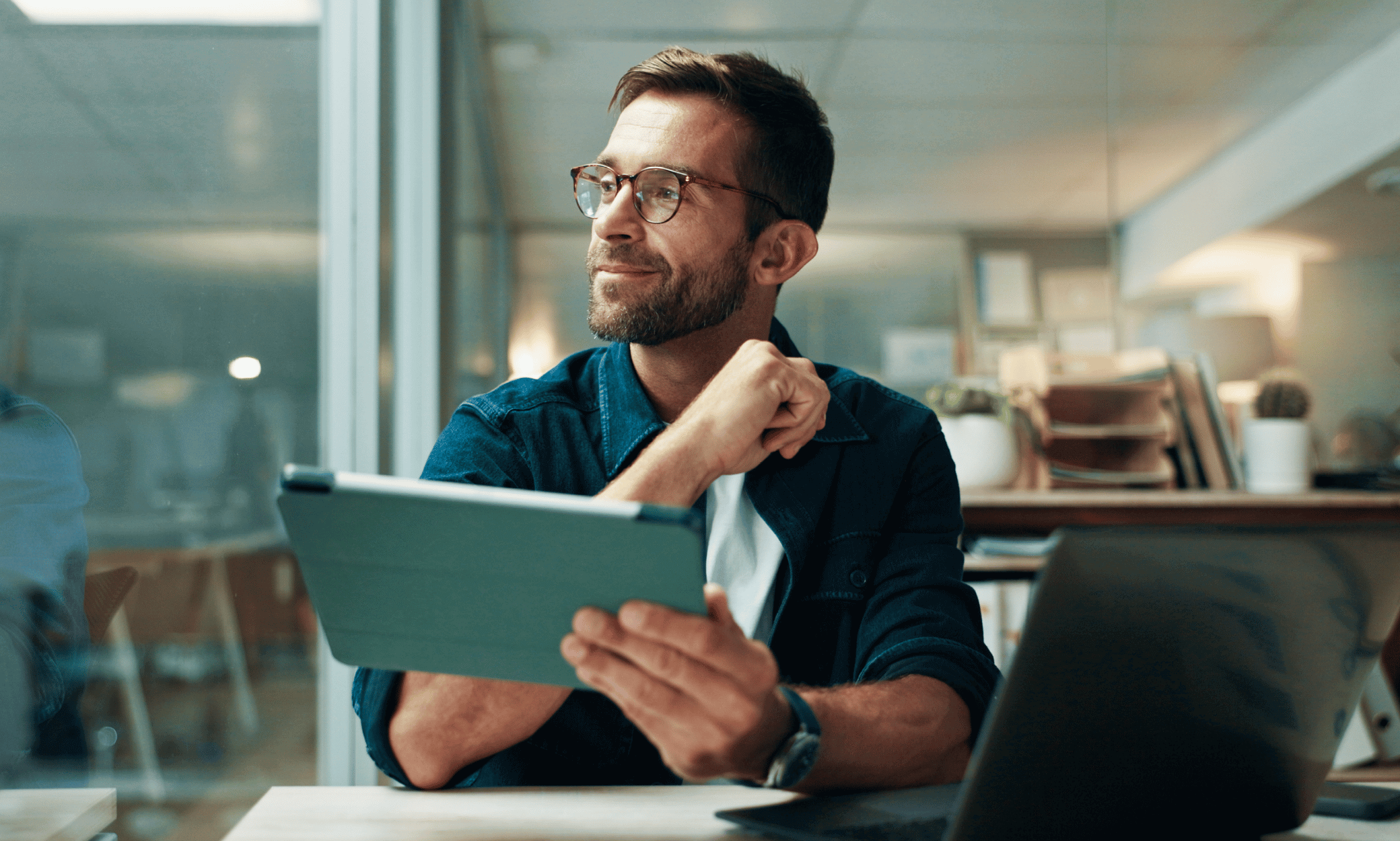 someone holding a tablet