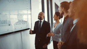 People looking at a financial forecast