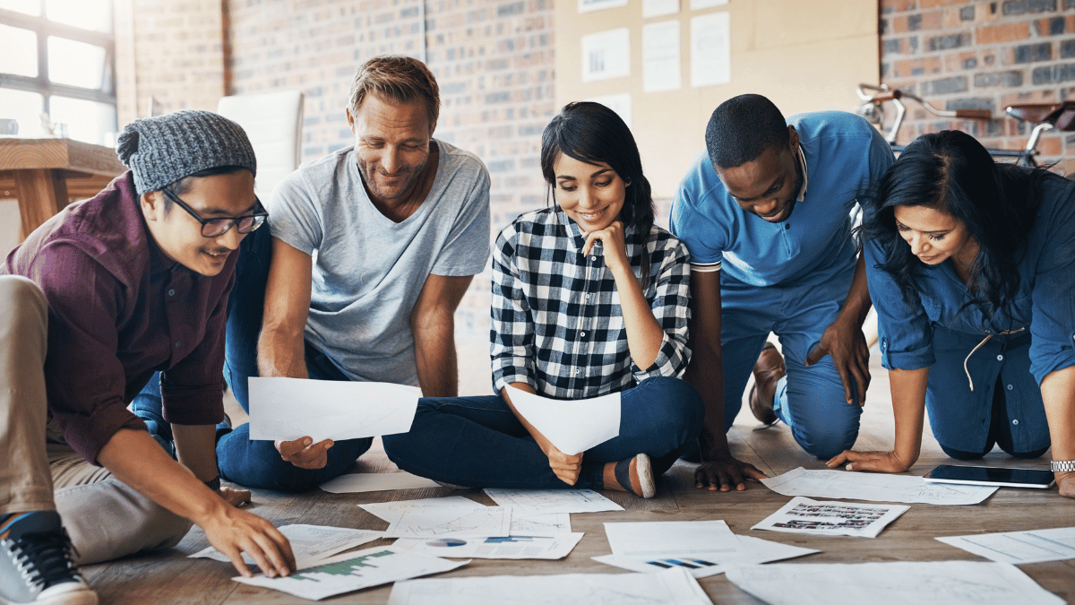 nonprofit workers looking at reports